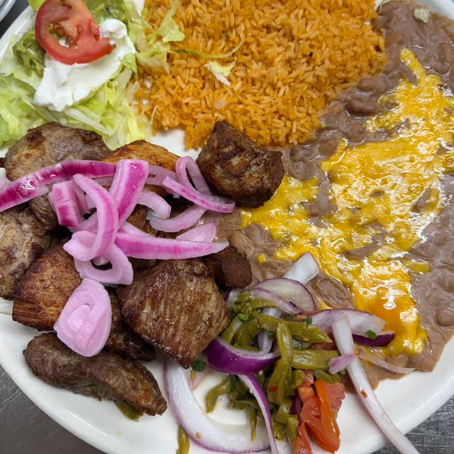 Carnitas De Puerco.