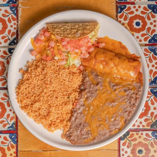 Don Pedro Mexican Restaurant's combination plate with rice, beans, a cheesy enchilada, and a taco.